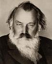 Johannes Brahms photo with dark hair and white beard