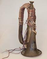 photo of an old worn bugle