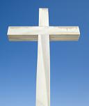 white cross against the blue sky