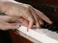 Playing the Piano - close-up