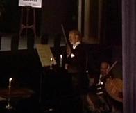 Dudley Simpson in The Talons of Weng-Chiang, conducting the song Daisy Bell