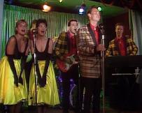 Keff McCulloch in Delta and the Bannermen, with guitar singing backing vocals with The Lorells