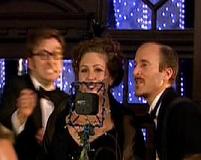 Murray Gold in Voyage of the Damned, with Yamit Mamo and David Tennant